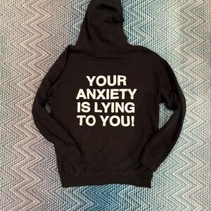 Black Hoodie with Bold White Text